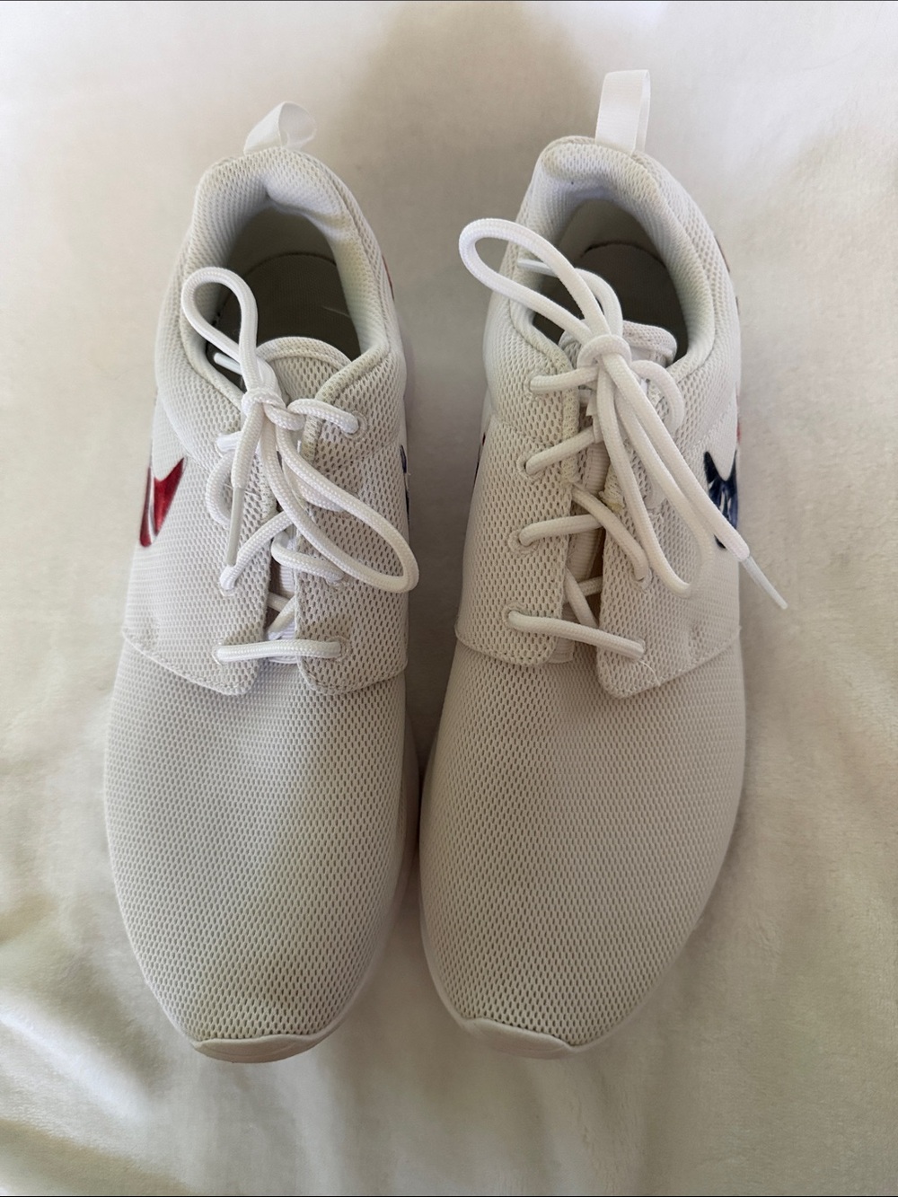 Nike White Sneakers with Red and Blue Swooshes